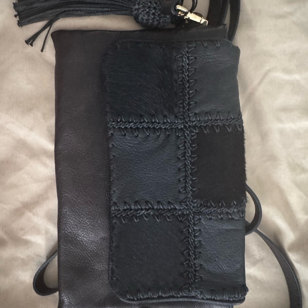 Sleek Black Leather Clutch with Textured Finish